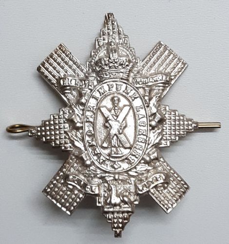 The Royal Highlanders Black Watch cap badge